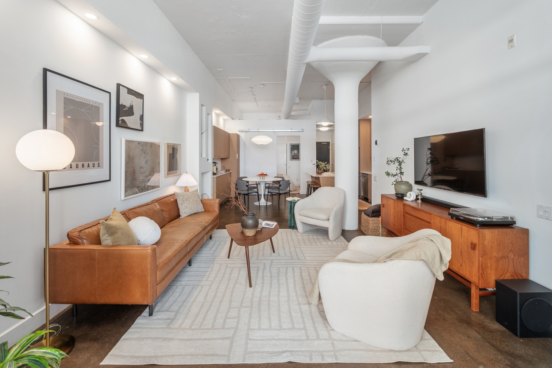 Wide living room with loft column