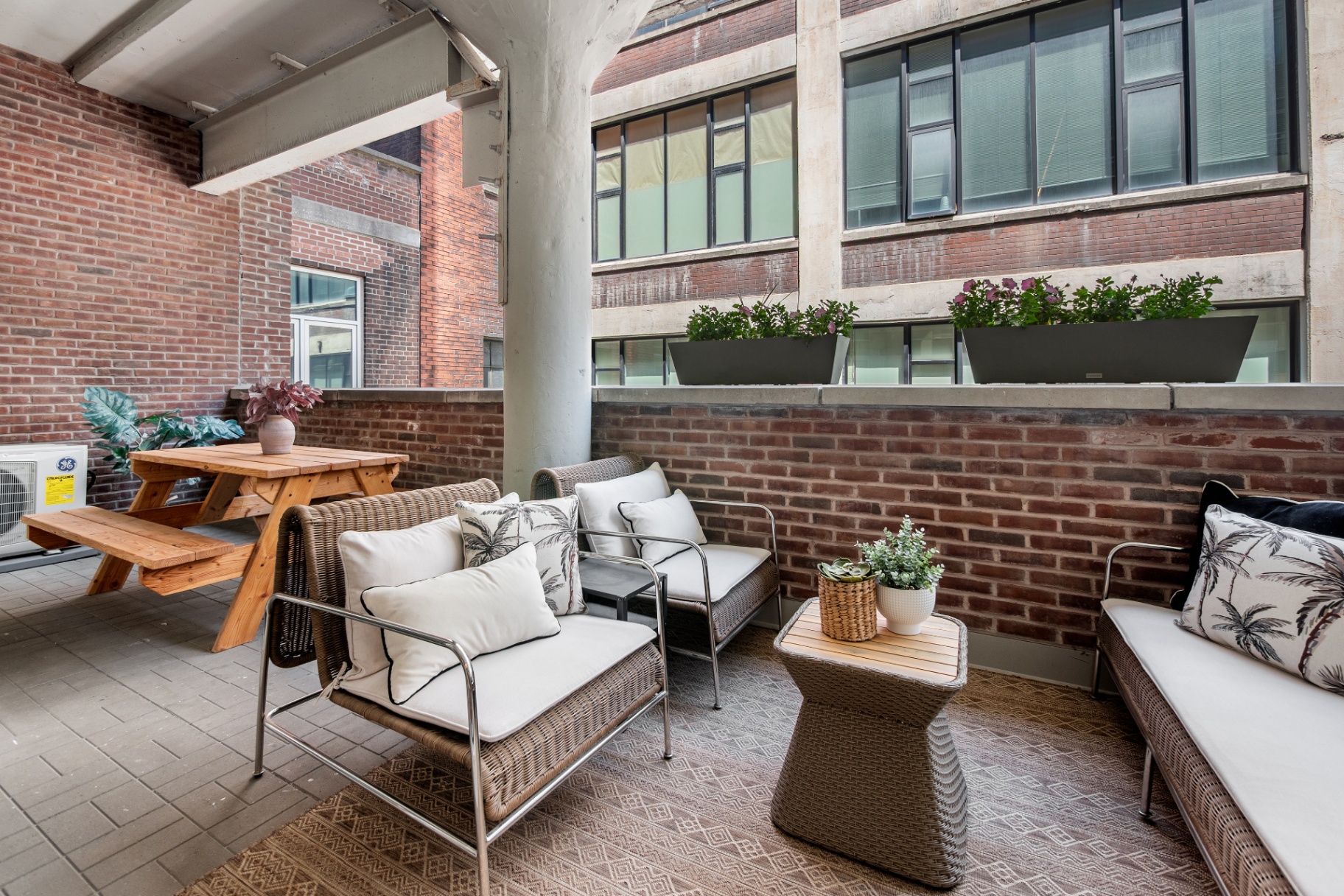 Terrace with lounge seating and picnic table