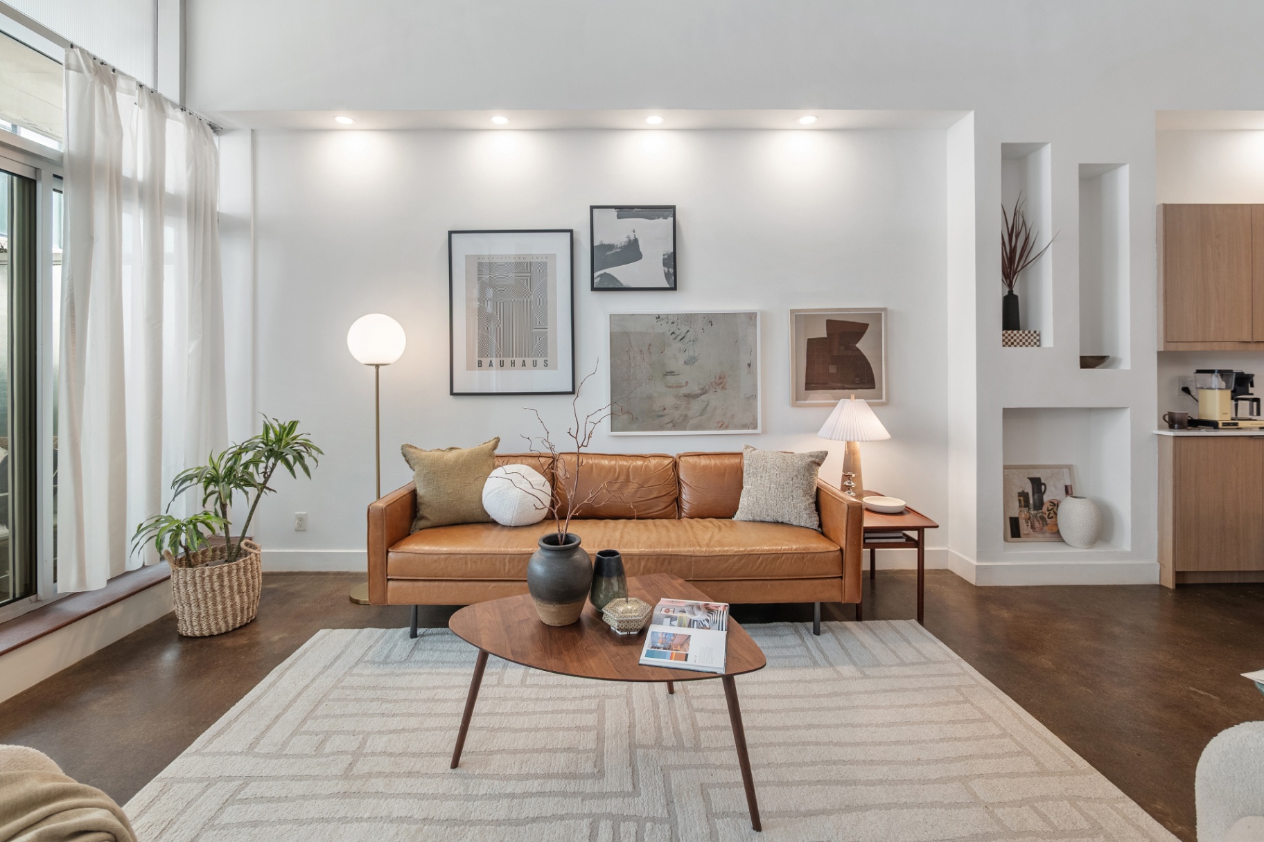 Front-facing sofa and artwork wall